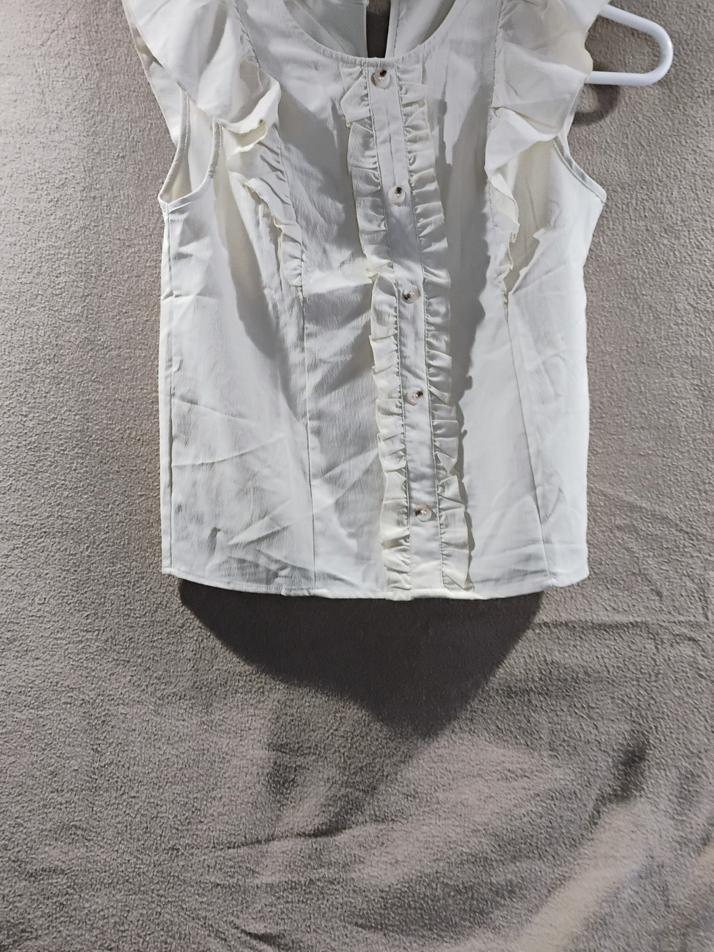 Women’s Cream Ruffle Front Sleeveless Blouse